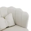 A close-up of a cream-colored chair with a bow-shaped pillow. Náhled obrázku produktu