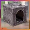 A close-up view of a gray cat house with an arched doorway and sisal-wrapped posts on top. Náhľad obrázku produktu