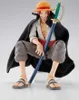 A detailed action figure of Shanks from One Piece, sitting with his sword. Náhled obrázku produktu