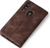 A brown leather flip case for a smartphone is shown at an angle against a white background. Produktbild-Vorschau