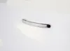 A close-up shot of a silver handle on a white surface. Náhľad obrázku produktu