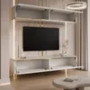A modern white and gold wall unit with a television, shelves, and cabinets. Produktbild-Vorschau