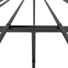 A close-up view of the black metal frame of a bed. Podgląd zdjęcia produktu