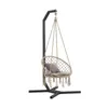 A hanging chair with a stand on a white background. Náhled obrázku produktu