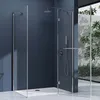 A modern corner shower enclosure with a white shower tray, glass panels, and chrome fixtures, set against a dark blue wall. A window with greenery is visible in the background. Produktbild-Vorschau