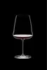 A single wine glass filled with red wine, isolated on a black background. Produktbild-Vorschau