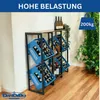 A metal and wood shelving unit filled with blue crates of bottles, placed in a room with a plant. Produktbild-Vorschau