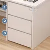 Close-up of a white desk with three drawers, showing measurement indicators. Produktbild-Vorschau