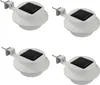 Four white solar-powered gutter lights are arranged in a two-by-two grid against a white background. Produktbild-Vorschau