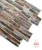 A close-up, angled view of several PVC wall panels with a stone and wood imitation texture, arranged diagonally on a white background. Produktbild-Vorschau