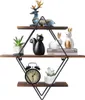 A diamond-shaped wall shelf with three wooden shelves, decorated with various items. Produktbild-Vorschau