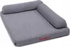 A dog bed with bolsters on three sides, shown from a slightly elevated side angle. Náhled obrázku produktu