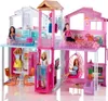 A multi-story Barbie dollhouse with several dolls. Podgląd zdjęcia produktu