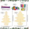 A flat lay of Christmas craft supplies including wooden Christmas trees, pipe cleaners, pom-poms, and colored pens, with dimensions indicated. Produktbild-Vorschau