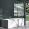 A modern bathroom with a bathtub and a glass shower screen with a striped pattern. Produktbild-Vorschau
