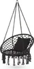A black macrame hanging chair with a black cushion, suspended by ropes. Voir les images du produit
