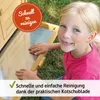 A young girl is shown interacting with a part of a wooden structure, possibly a playhouse or animal enclosure, in an outdoor setting. Produktbild-Vorschau