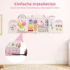 A pink wooden activity wall for toddlers mounted on a light pink wall, with a close-up inset showing installation. Produktbild-Vorschau