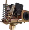 A mechanical pressure switch with springs and levers, isolated on a white background. Podgląd zdjęcia produktu
