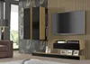 A modern living room setup featuring a wall-mounted entertainment unit with a TV, shelving, and storage cabinets. Produktbild-Vorschau