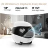 A white robot with a heart-shaped LED display on its front is shown in a living room setting, with text overlays highlighting its features. Produktbild-Vorschau