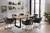 A dining room setting with a wooden table and chairs. Produktbild-Vorschau