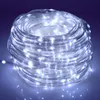 A coiled string of white LED lights on a reflective surface. Náhled obrázku produktu