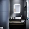A modern bathroom with a SONNI LED illuminated mirror above a sink. Náhled obrázku produktu