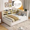 A bedroom scene featuring a beige upholstered bed with a built-in bookshelf headboard, decorated with framed pictures and a lamp. A laptop is placed on the headboard. Anteprima dell’immagine prodotto