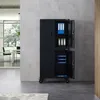 A black metal filing cabinet with two sections, each with doors, is shown in an office setting. The top section has blue and green binders, and the bottom section has blue file trays. The cabinet has wheels. Produktbild-Vorschau