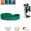 A green Blackroll super band is shown coiled, with packaging and certification icons visible. Podgląd zdjęcia produktu