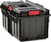 A black tool box with red latches and clear compartments on top, set against a white background. Náhled obrázku produktu
