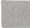 A close-up view of a textured rug or carpet with a woven pattern and a light gray border. Produktbild-Vorschau