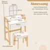 A diagram showing the dimensions of a vanity table and stool set, with measurements indicated by lines and numbers. Produktbild-Vorschau