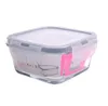 A glass food storage container with a clear lid and gray locking mechanism, shown against a white background. Produktbild-Vorschau