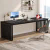 A modern home office setup with a long black desk, computer, laptop, and chair. Produktbild-Vorschau