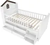 A white wooden children's bed with a house-shaped headboard and storage drawers underneath, shown from a diagonal angle. Náhľad obrázku produktu