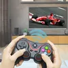 A person is holding a game controller in front of a television screen displaying a racing game. Produktbild-Vorschau