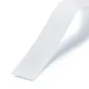 A close-up, angled view of a white fabric tape on a white background. Produktbild-Vorschau