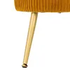 A close-up shot of the leg and bottom of a mustard-yellow velvet stool. Produktbild-Vorschau