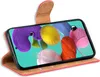 A red book-style phone case with a brown interior is shown open, displaying a smartphone with a colorful abstract wallpaper. Voir les images du produit