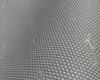 A close-up view of a textured surface with a repeating pattern of small circles, possibly a material or wallpaper. Podgląd zdjęcia produktu