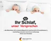 An elderly couple in bed with their heads peeking out from under the duvet. Produktbild-Vorschau