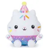 A white plush cat toy with a party hat and colorful sprinkles, sitting on a white background. Náhled obrázku produktu