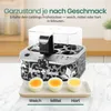 An egg cooker with three boiled eggs in front of it, labeled soft, medium, and hard. Produktbild-Vorschau