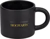 A black mug with the word "HOGWARTS" in gold lettering. Náhled obrázku produktu