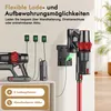 A cordless vacuum cleaner and its charging accessories are displayed against a wall, with text highlighting charging options. Produktbild-Vorschau