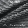 A close-up view of grey corduroy fabric with text overlays describing its features. Produktbild-Vorschau