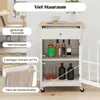 A white kitchen cart with a wooden top, featuring various storage compartments and labeled features. Podgląd zdjęcia produktu
