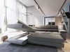 A modern living room with a large sectional sofa. Produktbild-Vorschau